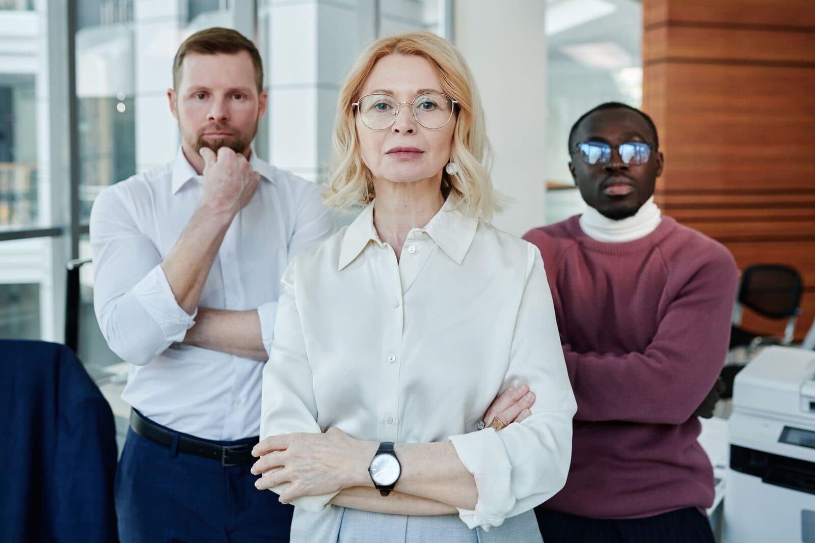A professional team standing together in their workplace